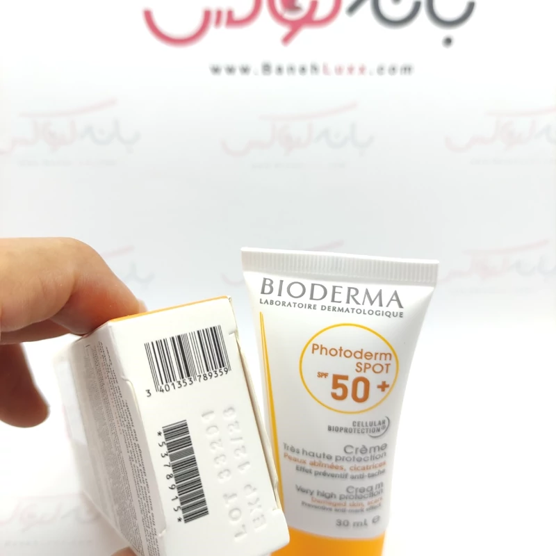 ضد آفتاب بی رنگ بیودرما SPF 50 مدل اسپات-آب رسانی قوی و ضد پیری پوست- تسکین دهنده پوست
