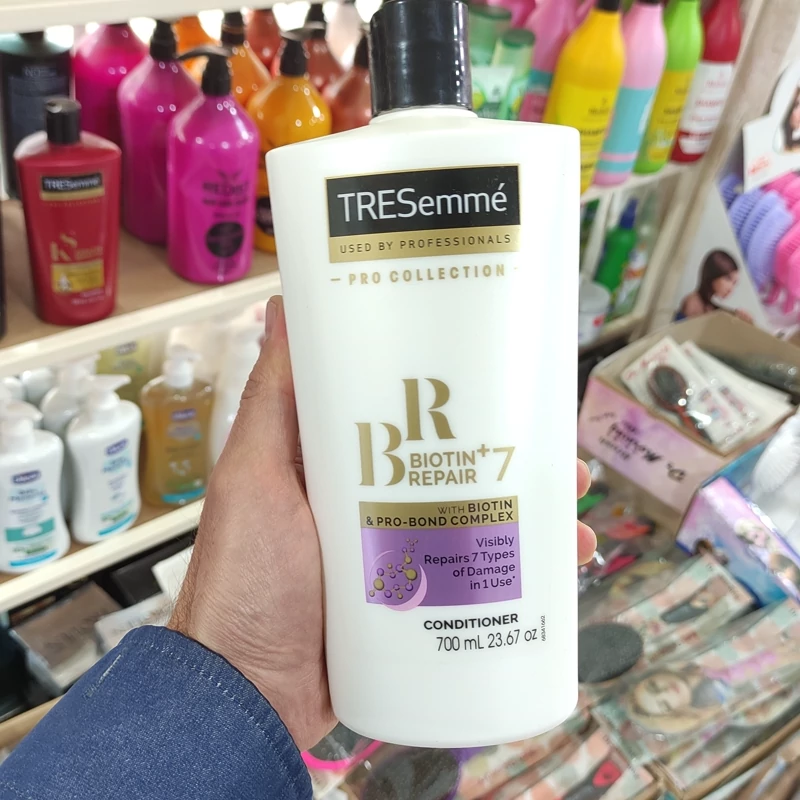 شامپو نرم کننده ترزمه مدل بیوتین ضد ریزش ترمیم کننده مو